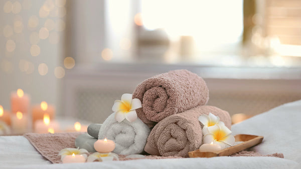 Beautiful spa composition on massage table in wellness center