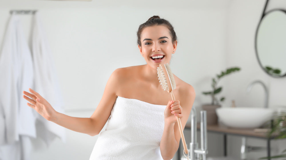 Morning of beautiful young woman singing in bathroom