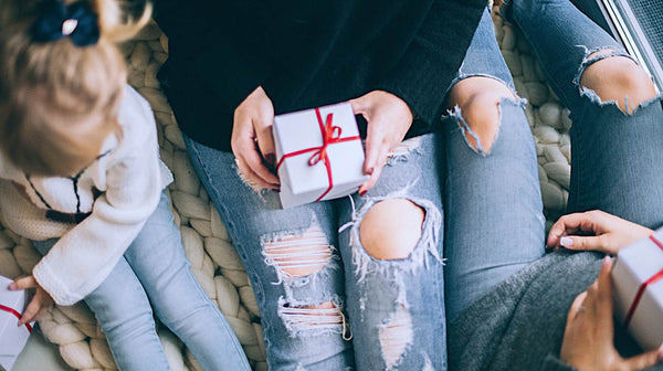 photo of family exchanging gifts