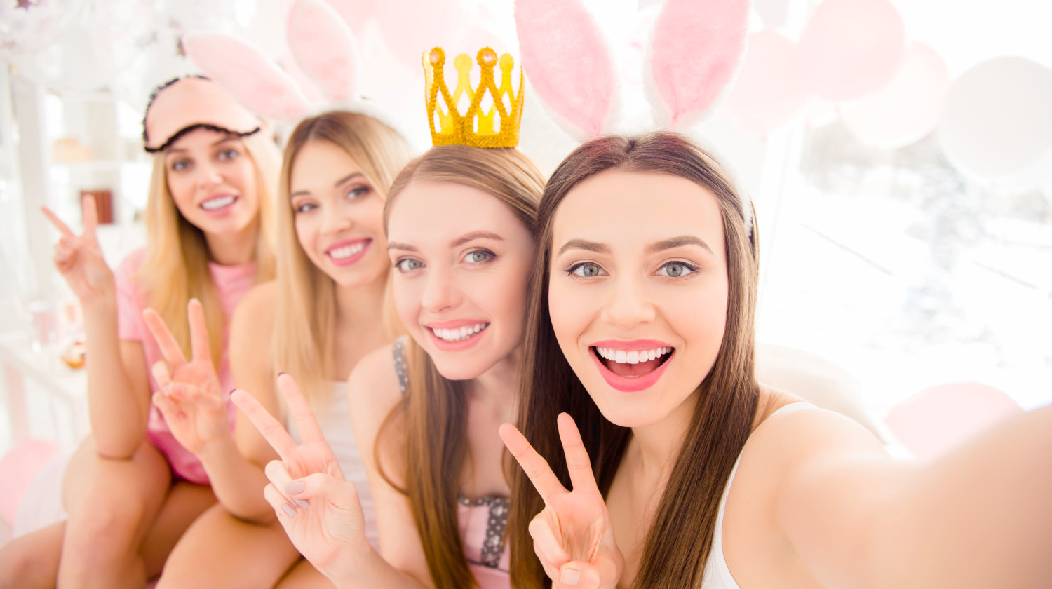 Feature | eye mask on heads shooting selfie on front camera showing | Plan The Perfect Slumber Party With This Checklist