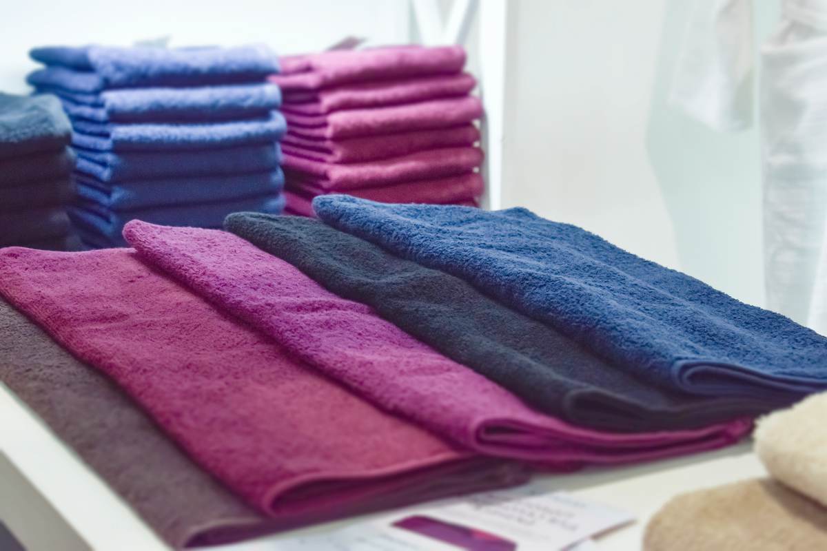 pink maroon purple blacktfluffy towels | How To Choose The Best Salon Towels and Robes | salon towels | best salon towel