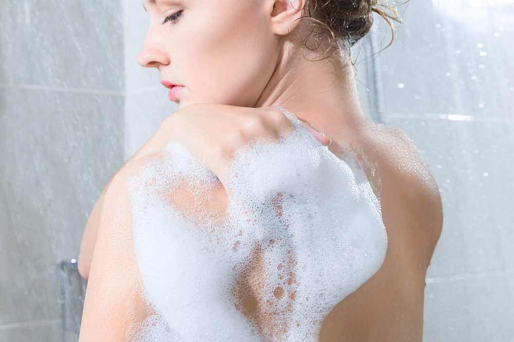 https://robemart.com/blog/wp-content/webpc-passthru.php?src=https://robemart.com/blog/wp-content/uploads/2020/02/young-woman-washing-body-shower-rear-bathroom-essentials-ss.jpg&nocache=1