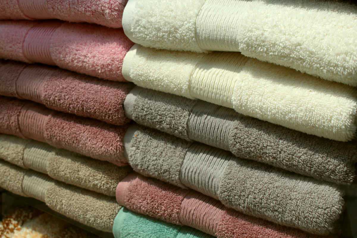 Towels in linen bathroom | How To Fold Towels | Step by Step Guide