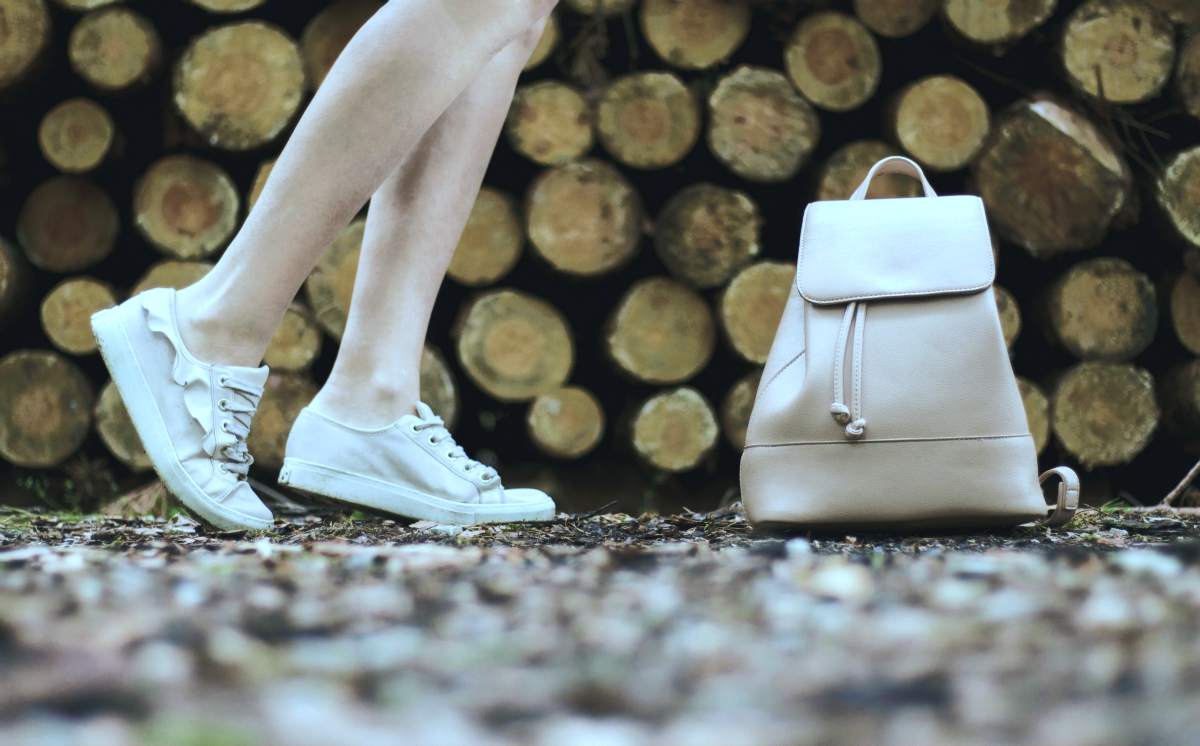 woman white shoes and bag | Travel Essentials For Women | travel essentials