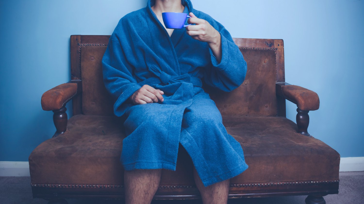 Featured | man holding cup wearingbathrobe | Coziest And Most Stylish Men’s Bathrobes | men's bathrobe | mens terry cloth bathrobe