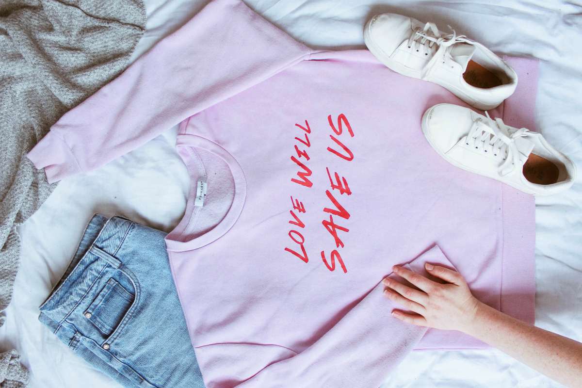 pink long-sleeved shirt on white textile near white low-top sneakers and blue denim bottoms | Getting Ready Tips that Will Make Your Mornings Hassle-Free | getting ready | get ready faster