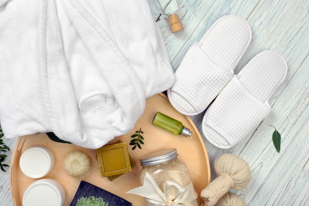 Beautiful spa composition with bathrobe and accessories | Reasons Why Nonskid Spa Slippers Are The Best Option For Your Spa | washable spa slippers