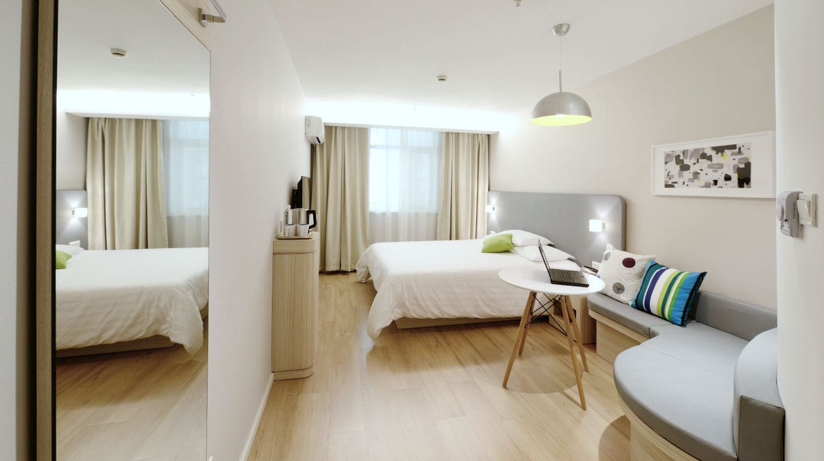 apartment motel room with queen size bed