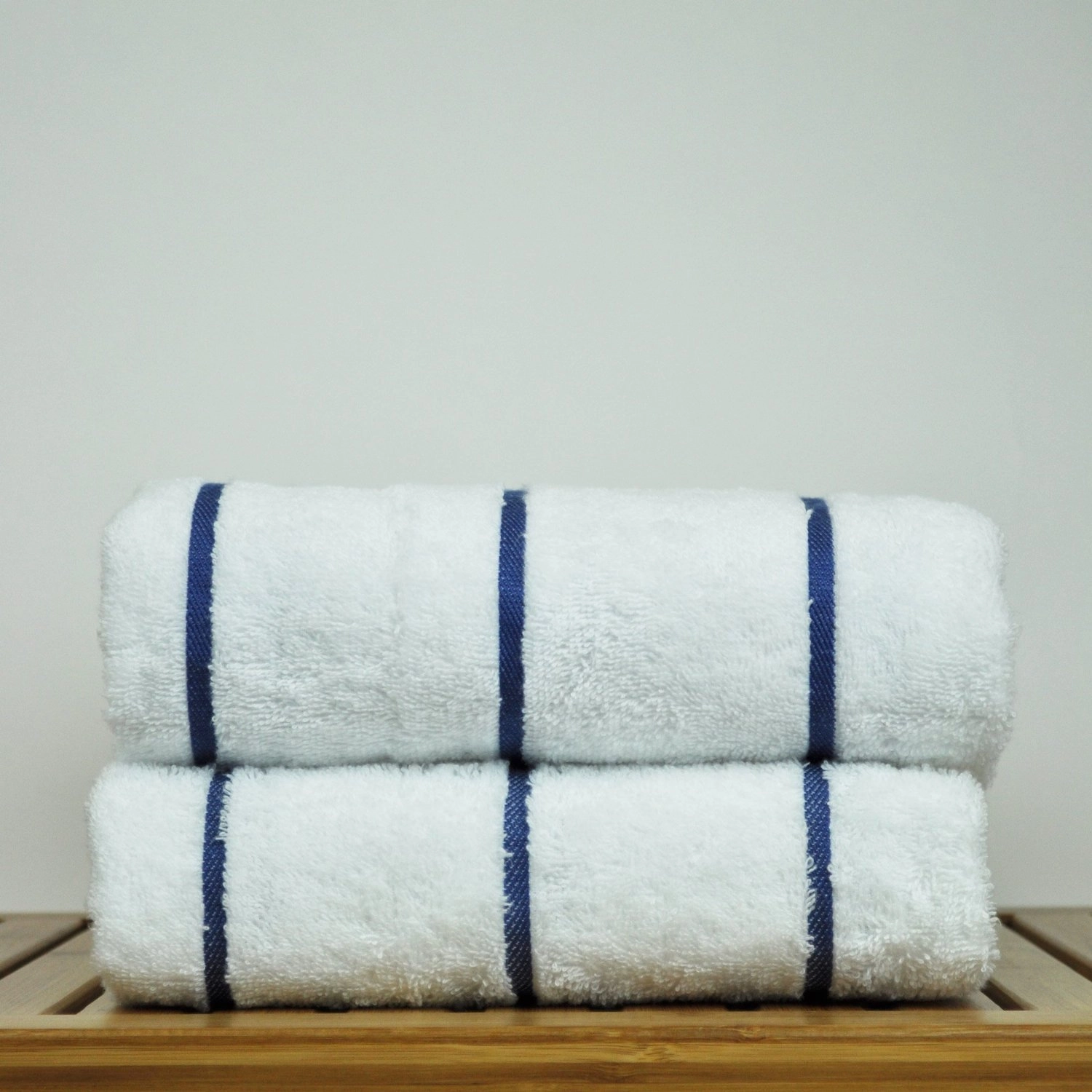 https://robemart.com/images/thumbnails/product/1/Luxury-Hotel-Spa-Towel-Turkish-Cotton-White-Royal-Blue-Striped-Pool-Beach-Towel-Chakir-Linen1.webp